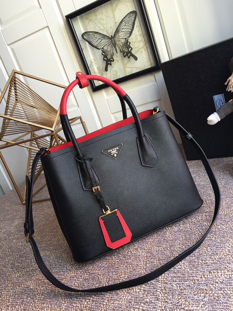 Pra*a top handle bags